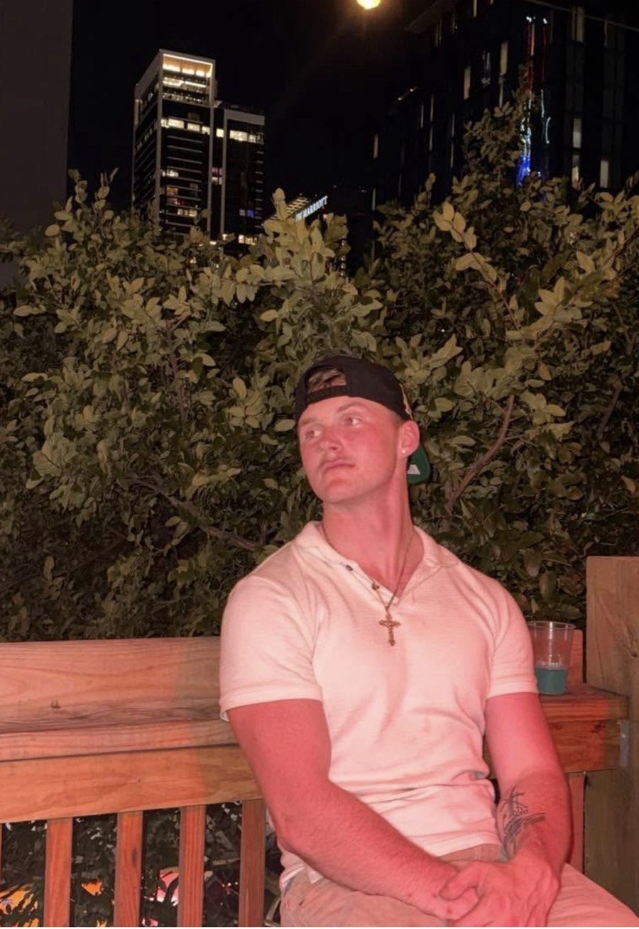 Ethan, who built Oracle, sitting outside at night